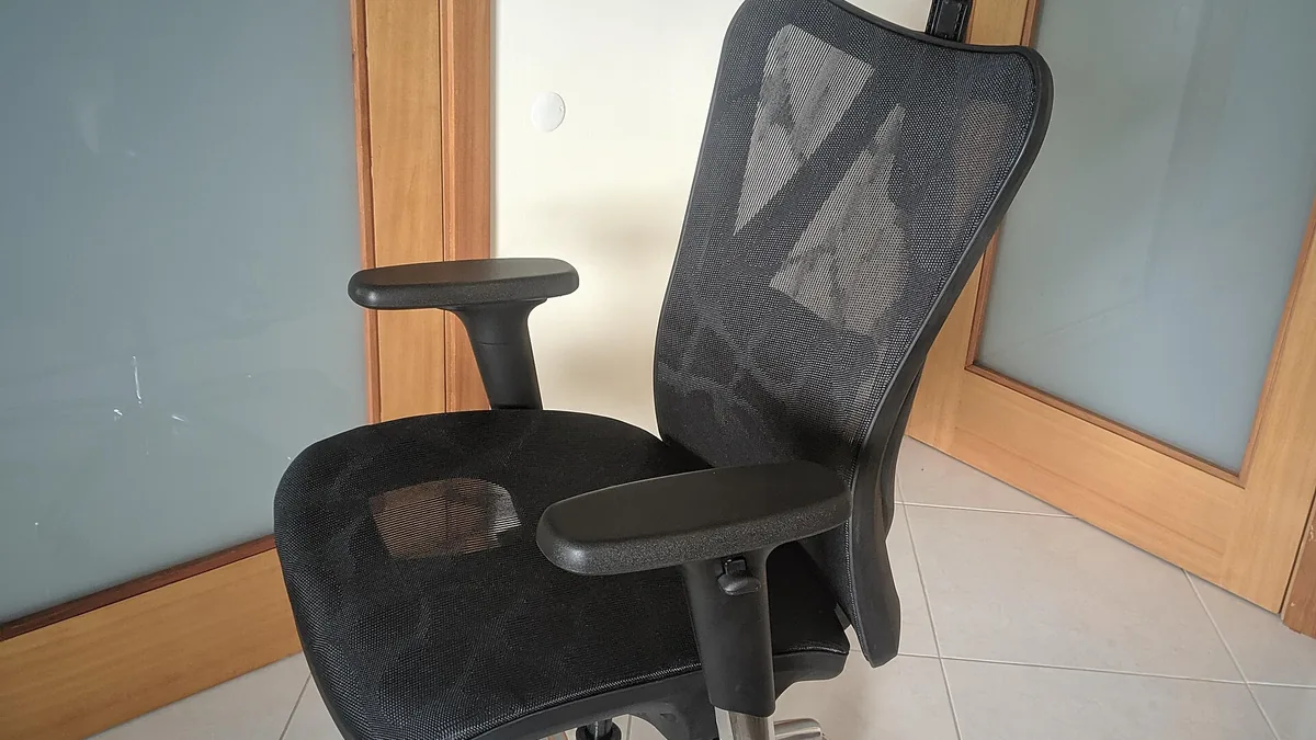 White Mesh vs Upholstery white chair workspace detail
